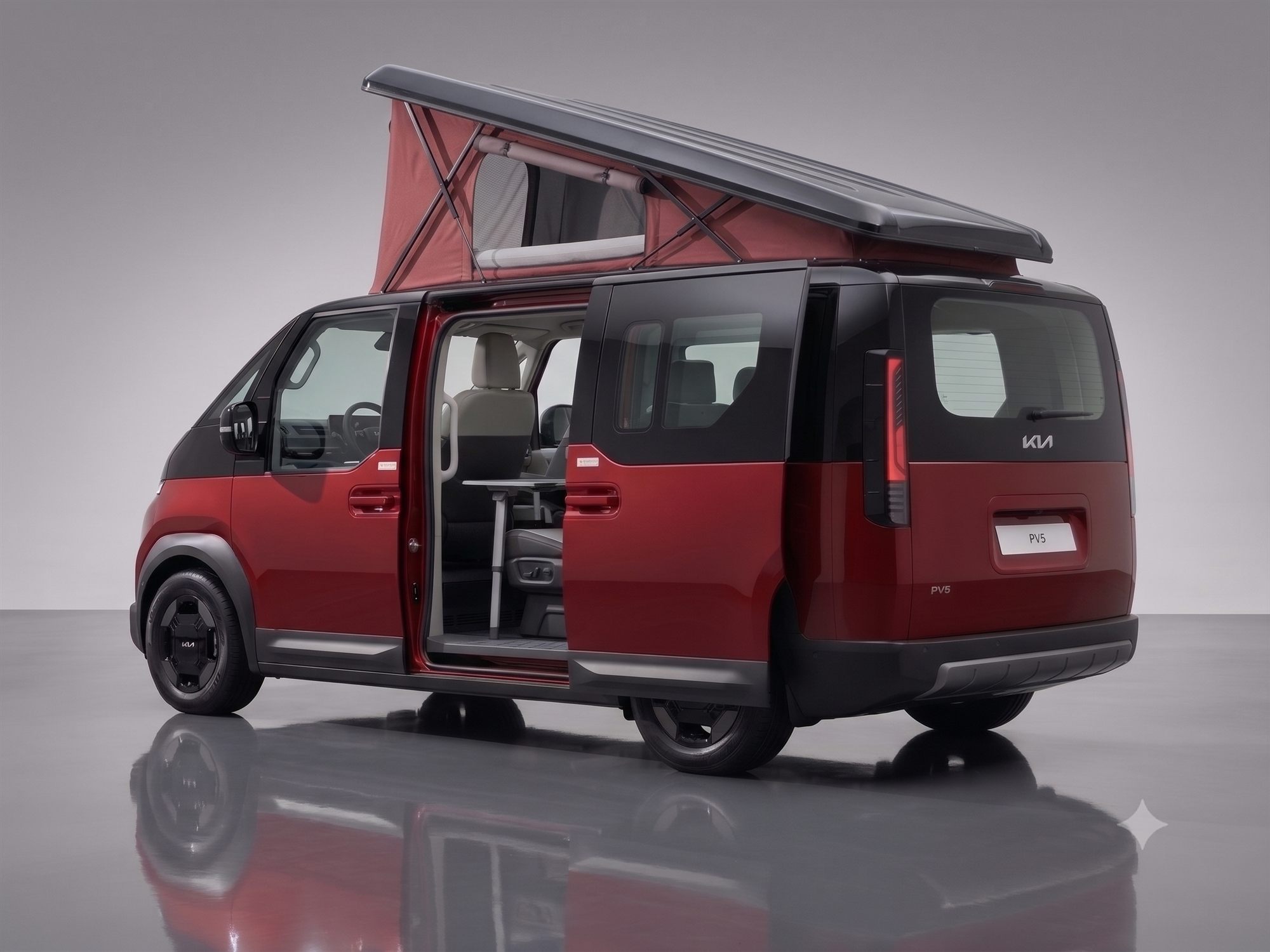 The Aurelis One with its pop-top raised and the sliding door open